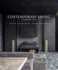 Dark grey interior with slate tiles, modern steel fireplace with logs, 'CONTEMPORARY LIVING YEARBOOK 2023', in white font above.
