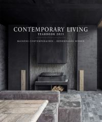 Book cover of Contemporary Living Yearbook 2023, with a dark gray interior of slate tiles, and a modern steel fireplace with logs. Published by Beta-Plus.