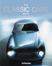 Pale blue classic car with split screen, front headlights on, THE CLASSIC CARS BOOK, in shiny silver font above.