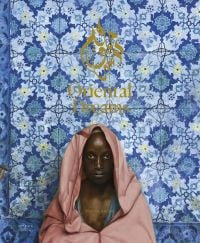 Black male dressed in pink robe, with blue mosaic tiles behind, on cover of 'Oriental Dreams', by Editions Norma.