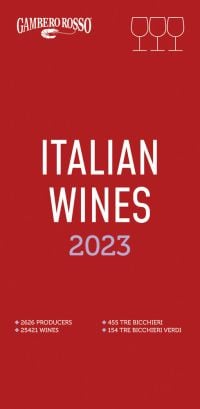 'ITALIAN WINES 2023', in white and pale blue font to centre of red cover, three wine glasses to top right, by Gambero Rosso.