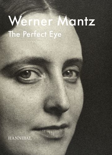 Portrait of white female looking at viewer, Werner Mantz, The Perfect Eye, in white font above.