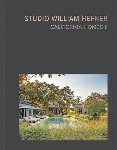 Luxury getaway residence with swimming pool surrounded by grasses, on grey cover of 'California Homes II, Studio William Hefner', by Images Publishing.