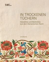 Off-white cloth with floral embroidery to bottom, on cover of 'In Trockenen Tüchern, Gewebtes und Besticktes aus dem Osmanischen Reich', by Arnoldsche Art Publishers.