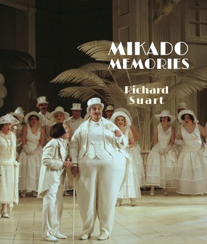 Cast of Mikado dressed in white, on stage, 'MIKADO MEMORIES', in white font to upper right corner, by Pallas Athene.