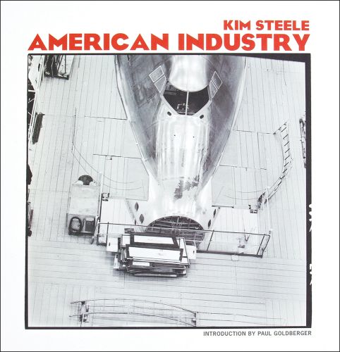 Silver nose of Jumbo jet, on white cover of 'American Industry', by ORO Editions.
