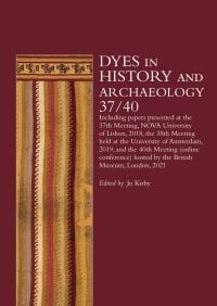 Striped piece of fabric with decorative border, on burgundy cover of 'Dyes in History and Archaeology 37/40', by Archetype Publications.