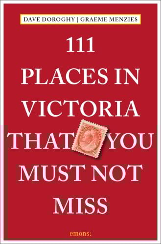 Book cover of 111 Places in Victoria That You Must Not Miss, with a red Canadian stamp bearing Queen Victoria's head. Published by Emons Verlag.