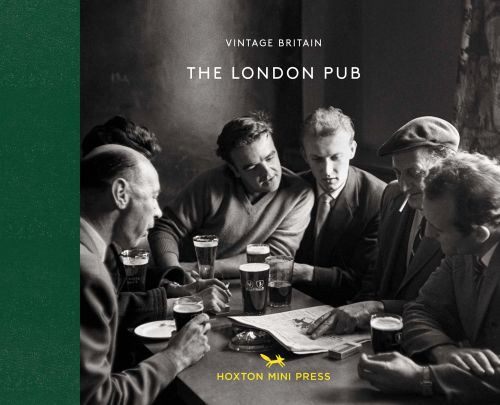 Group of white men sitting at table with pints of beer and newspaper, one smoking, on landscape cover of 'The London Pub', by Hoxton Mini Press.