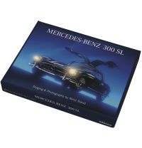 Mercedes-Benz 300 SL with open gull wing doors, on front of art card box, by teNeues Books.