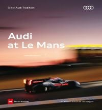 Blurred Audi R8 racing car on race track, on cover of 'Audi in Le Mans', by Delius Klasing Verlag GmbH.