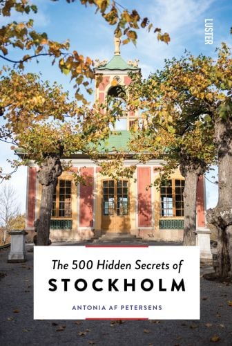 Haga Palace, with bell tower, on cover of travel guide 'The 500 Hidden Secrets of Stockholm', by Luster Publishing.
