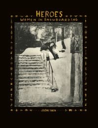 Female snowboarder sliding down rail of steps covered in snow, on cover of 'Heroes, Women in Snowboarding', by ACC Art Books.