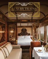 The luxurious Budapest Grand Suite on the Venice Simplon - Orient-Express, carved wood headboard, on cover of 'Luxury Trains', by ACC Art Books.