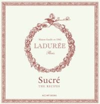 Ring of acorns and leaves on cover of 'Ladurée Sucré , The Recipes', by ACC Art Books.