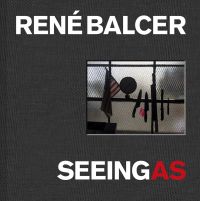 Row of knives and a machete, on magnetic strip, American flag and globe to left, on black cover of 'Seeing As, René Balcer', by ACC Art Books.