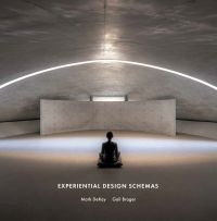 Person sitting cross-legged on cushion, in domed building space with strip of light above, on cover of 'Experiential Design Schemas', by ORO Editions.