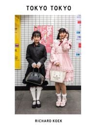 Two Japanese girls in underground station: one in black dress, one in pale pink, both holding handbags, on white cover of 'Tokyo Tokyo', by Lannoo Publishers.