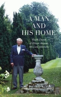 Book cover of Ralph Dutton of Hinton Ampner, A Man and his Home, with a man in blue jacket, holding walking stick while leaning on concrete sundial in garden lined with conifer trees. Published by Pallas Athene.