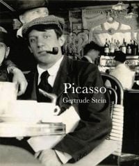A young Pablo in flat cap, smoking a pipe, sitting at café table, on cover of 'Picasso', by Pallas Athene.