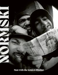 American hip hop trio, The Alkaholics, one member holding a ten-pound note, on cover of 'Normski, Man with the Golden Shutter', by ACC Art Books.