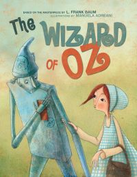 Tinman holding his heart, with Dorothy holding his arm, on cover of 'The Wizard of Oz, Based on the Masterpiece by L. Frank Baum', by White Star.