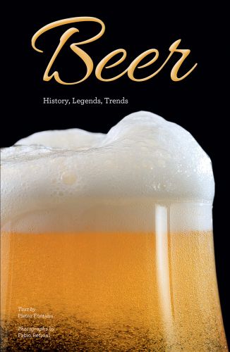 Frothy head of pint of amber coloured beer, on cover of 'Beer, History, Legends, Trends', by White Star.