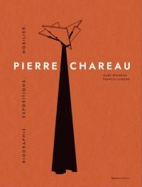 Tall black cone with triangle shapes to top, on orange cover of 'Pierre Chareau. Volume 1, Biographie. Expositions. Mobilier.', by Editions Norma.