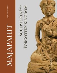 Terracotta sculpture of figure crossed-legged on plinth, on cover of 'Majapahit, Sculptures from a Forgotten Kingdom', by Arnoldsche Art Publishers.