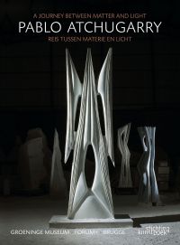 Book cover of Pablo Atchugarry, A Journey Between Matter and Light, featuring a white, elegant, monolithic sculpture. Published by Stichting.