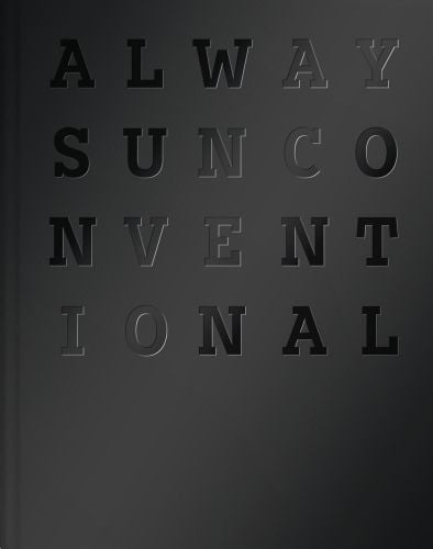 Black and grey cover with capitalized font on 'Always Unconventional', by Delius Klasing Verlag GmbH.