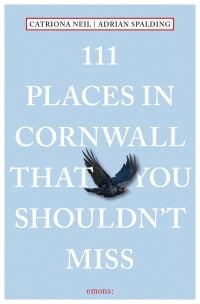 Black Cornish crown, near center of sky blue cover of '111 Places in Cornwall That You Shouldn't Miss', by Emons Verlag.