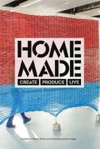 Book cover of Home Made, Create, Produce, Live, with a red and blue woven sheet suspended from ceiling with cement weights to bottom. Published by Stichting.