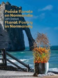 Book cover of Cédric Deshayes's Floral Poetry in Normandy, featuring a corkscrew hazel plant in glazed pot, with the chalk cliffs of Etretat and the sea behind. Published by Stichting.