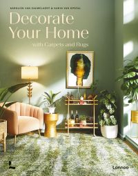 Book cover of Decorate Your Home With Carpets and Rugs, with an interior living space blush velvet scallop chair, houseplants and gold drinks trolley. Published by Lannoo Publishers.