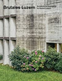 Grey concrete building with green bushes with pink flowers below, on cover of 'Brutales Luzern, Brutalistische Architektur im Kanton Luzern', by Quart Publishers.