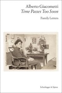Book cover of Alberto Giacometti—Time Passes Too Soon: Family Letters, with the artist sitting in a chair, with pictures on the walls. Published by Scheidegger & Spiess.