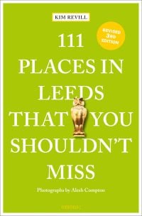 Golden Owl emblem, near center of blue travel guide cover of '111 Places in Leeds That You Shouldn't Miss', by Emons Verlag.