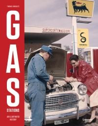 Petrol assistant in blue overalls filling up white car, woman leaning on side of bonnet, on cover of 'Gas Stations, An Illustrated History', by Lannoo Publishers.