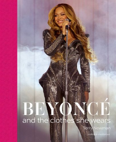 Beyoncé performing on stage in a silver mirrored dress, on cover of 'Beyoncé, and the clothes she wears', by ACC Art Books.