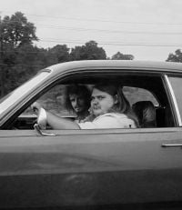 Book cover of Scott Mead's Rites of Passage, with two males in car staring at camera. Published by Hurtwood Press Ltd.