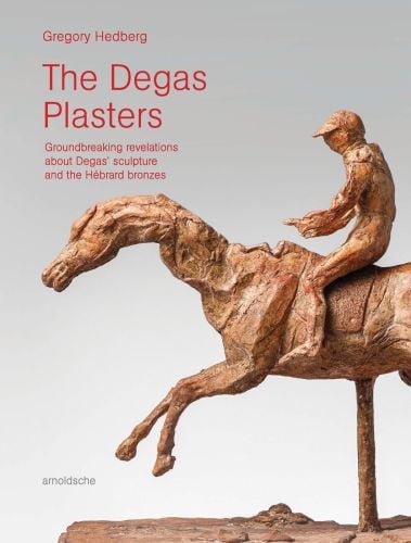 Pale grey cover of Gregory Hedberg's The Degas Plasters, Groundbreaking revelations about Degas’ sculpture and the Hébrard bronzes, featuring a plaster sculpture of female ballerina with one arm in air, on plinth. Published by Arnoldsche Art Publishers.