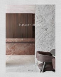 Book cover of Signature Interiors with a marble interior and dark wall panelling. Published by Beta-Plus.
