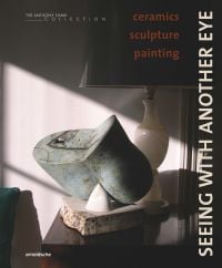 Book cover of David Whiting's Seeing with Another Eye: ceramics – sculpture – painting: The Anthony Shaw Collection, with abstract sculpture, lamp behind. Published by Arnoldsche Art Publishers.
