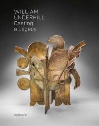 Bronze abstract sculptural vessel in exhibition space, on cover of 'William Underhill', by Arnoldsche Art Publishers.