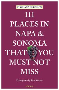 Guide book cover of 111 Places in Napa and Sonoma That You Must Not Miss, with a bunch of dark purple grapes. Published by Emons Verlag.