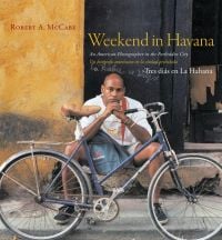 Book cover of Weekend in Havana: An American Photographer in the Forbidden City, featuring a man sitting on steps, with a bicycle in front. Published by Abbeville Press.