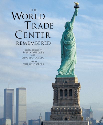 Book cover of Sonja Bullaty's The World Trade Center Remembered, featuring the Statue of Liberty with the twin towers behind. Published by Abbeville Press.