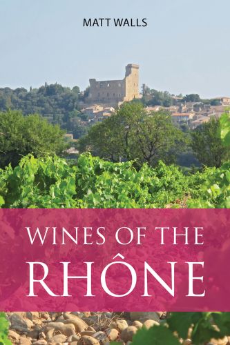 Book cover of Matt Wall's guide, Wines of the Rhône, with vineyards and castle behind. Published by Academie du Vin.
