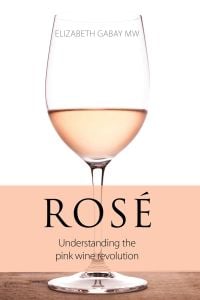 Book cover of Elizabeth Gabay's Rosé, Understanding the Pink Wine Revolution, with a wine glass of Rose on table. Published by Academie du Vin Library.